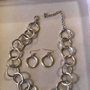 Silver tone necklace with matching earrings
